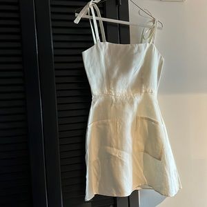 Adorable white summer dress! Great for summer outings or bridal events!